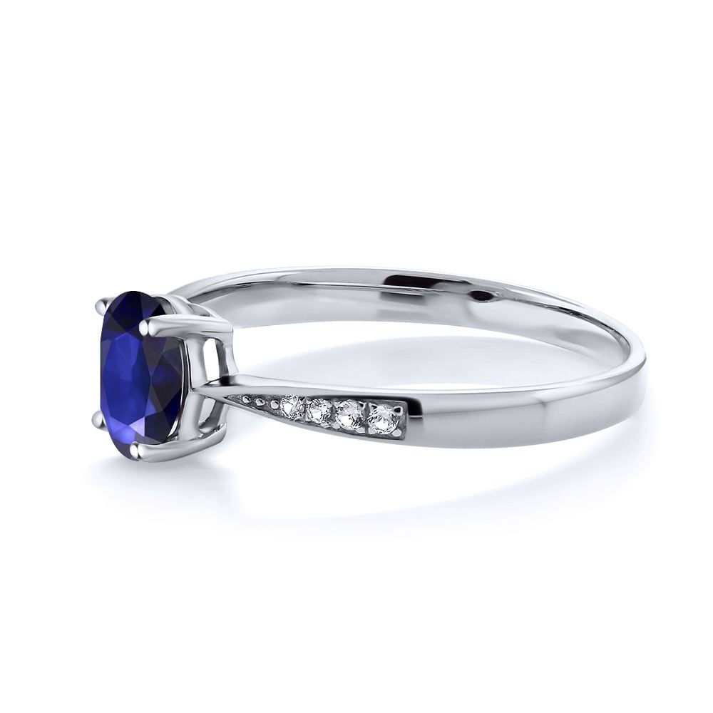 Gem Stone King 10K White Gold Blue Sapphire and White Diamond Engagement Ring for Women (0.63 Cttw, Gemstone September Birthstone, Oval 7X5MM, Available in Size 5, 6, 7, 8, 9)