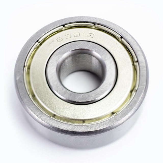baleros para moto kinlley 6301zz sellados 6301zz vista frontal centrada de rodamiento sellado 6301ZZ en acero con sello metálico y pista interior circular, acabado metálico, marca Kinlley; diseñado para montaje en ejes y sistemas de rueda de motocicleta, fácil instalación y uso rudo, también se usa comúnmente en poleas y cojinetes de transmisión ligera.