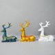 thumbnail image 2 of Ounissouiy Estatuilla decorativa de ciervo, estatua de la suerte, modelo creativo, artesanías, recuerdos personalizados, suministros de Decoración del hogar Azul, 2 of 6