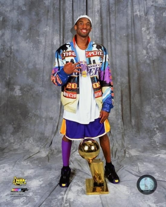 kobe bryant with trophy