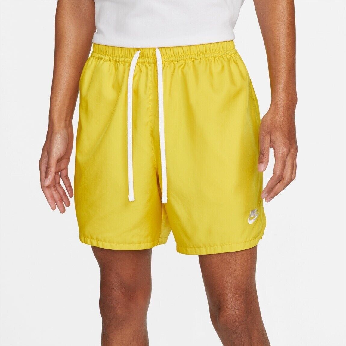 yellow nike woven shorts