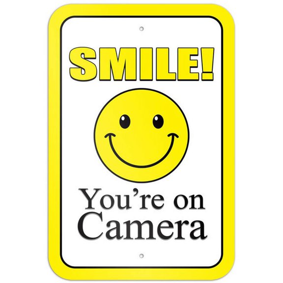 Smile You're on Camera Yellow Sign