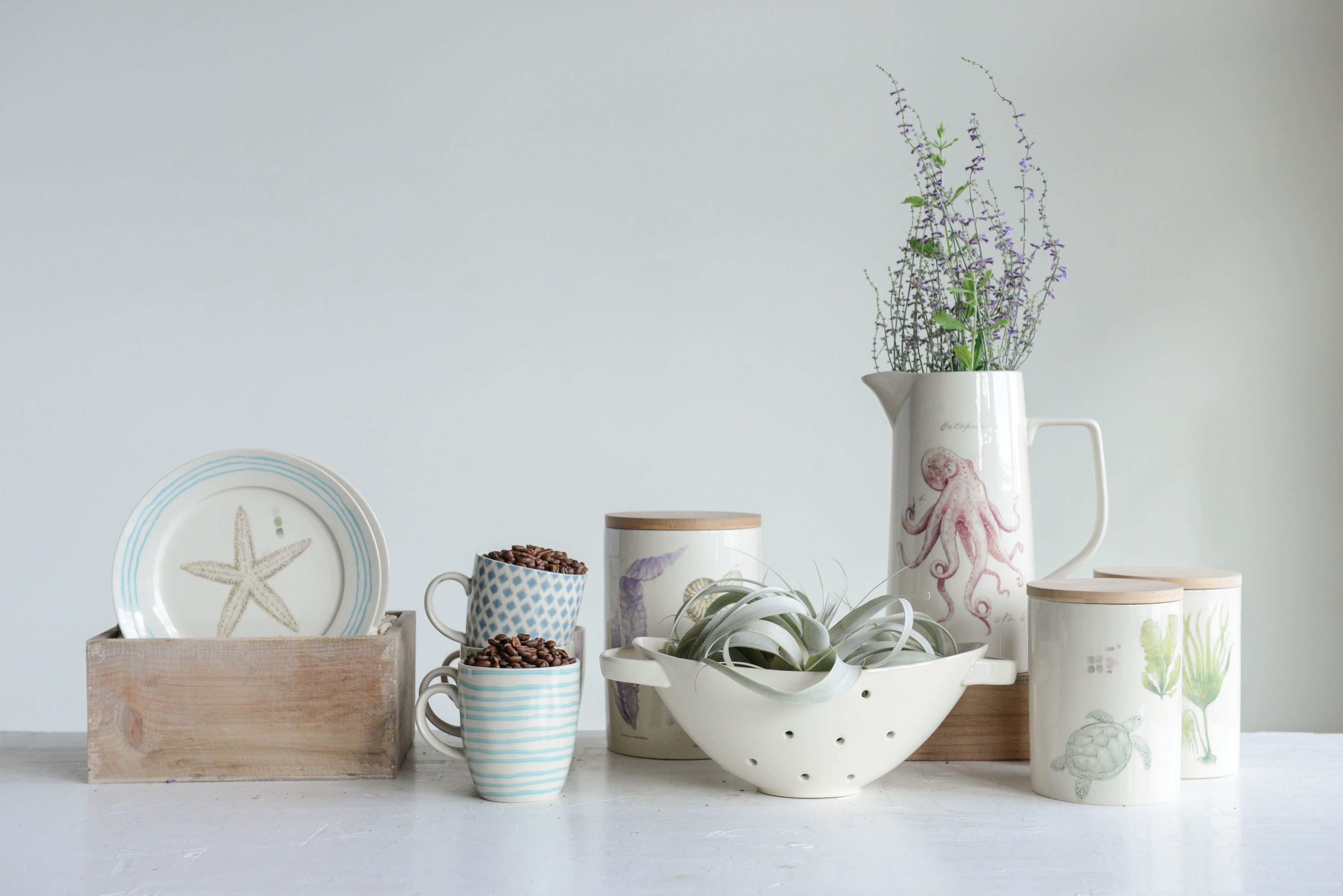 Creative CoOp Stoneware Canister with Sea Life & Bamboo Lid (Set of 2