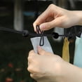 thumbnail image 4 of Fesfesfes Retractable Travel Clothesline with 12 Clips,Windproof Portable Drying Rack for Hotel, Camping, Compact Space Saving, Outdoor Camping Use Black, 4 of 5