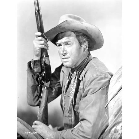 James Stewart Posed in Leather Jacket and Neckerchieft with Cowboy Hat while Holding a Sawed-Off Shotgun Photo