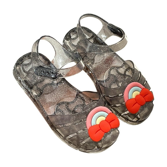 Xfvqtps Girls Jelly Sandals Cross Straps Closed Toe Hollow out Sequin Rainbow Bow Decoration Hook and Loop Durable Non Slip Washable Lightweight Summer PVC Water Shoes for 2-6 Years Black