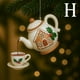 thumbnail image 1 of Adorno navideño vintage de tetera con efecto de té vertido | Decoración festiva para taza de té con acebo y frutos rojos | Regalo navideño para amantes del té y coleccionistas, 1 of 3