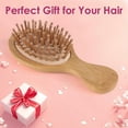 thumbnail image 3 of Mini cepillo de pelo de bambú y madera, peine desenredante antiestático para mujeres y niños, ideal para masajes capilares en viajes., 3 of 5