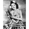 thumbnail image 2 of Eleanor Parker Wearing An Outfit Sent To Her By Her Husband Navy Lieutenant Fred Losee Who Is Stationed In The South Pacific December 1943 Photo Print (16 x 20), 2 of 2