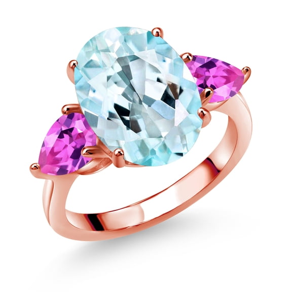 Gem Stone King 18K Rose Gold Plated Silver Sky Blue Topaz and Pink Created Sapphire Ring for Women (8.18 Cttw, 14X10MM Oval and 7X5MM Pear Shape, Gemstone November Birthstone, Size 5)