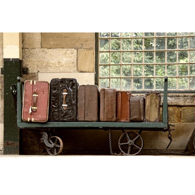 Suitcases On A Luggage Trolley in A Train Station Poster Print, Large