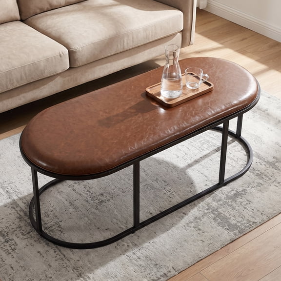 55" Oval Faux Leather Coffee Table with Sturdy Black Metal Base, Modern Industrial Ottoman-Style Center Table for Living Room