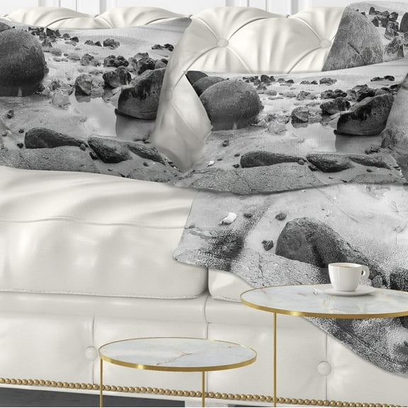 Designart Moeraki Boulders Black n White - Seashore Photo Throw Pillow - 12x20