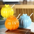 thumbnail image 1 of Recipiente de Cerámica para Té con Forma de Calabaza | Recipiente Resistente Al Calor para Especias y Sopas con Tapa y Cuchara | 12,5 X 12,5 X 12,2 Cm | Opciones En Naranja, Amarillo y Azul, 1 of 6
