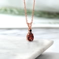 thumbnail image 4 of Gem Stone King 18K Rose Gold Plated Silver Red Garnet and Black Diamond Pendant Necklace for Women (1.49 Cttw, Gemstone January Birthstone, Pear Shape 9X6MM, with 18 inch Chain), 4 of 4