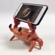 thumbnail image 2 of Mini Speaker Phone Holder 360 Surround Sound Wireless, 1 Piece, Orange H Banmo, 2 of 2