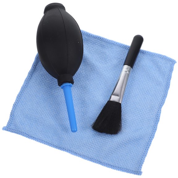 Bomba sopladora de aire de silicona para limpiar lentes de cámara con paño de limpieza y cepillo.