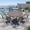 Graywood Table- Gray Chairs, variant on VOXBIN 5 Pieces Patio Dining Set - 40.7" Round Metal Table and 4 Stackable Chairs, Graywood Table and Gray Chairs