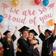 thumbnail image 6 of 2026 Graduation Glitter Banner, "We Are So Proud Of You" Garland with Grad Cap Accents, Class of 2026 Keepsake Banner, Pink Graduation Decor for School, Home, Car & Graduation Celebration Parties, 6 of 7