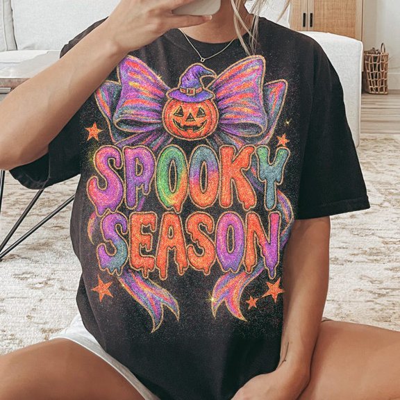 Neon Coquette Halloween T-Shirt – Spooky Season Tee with Witchy Pumpkin Bow and Bright Preppy Halloween Vibes