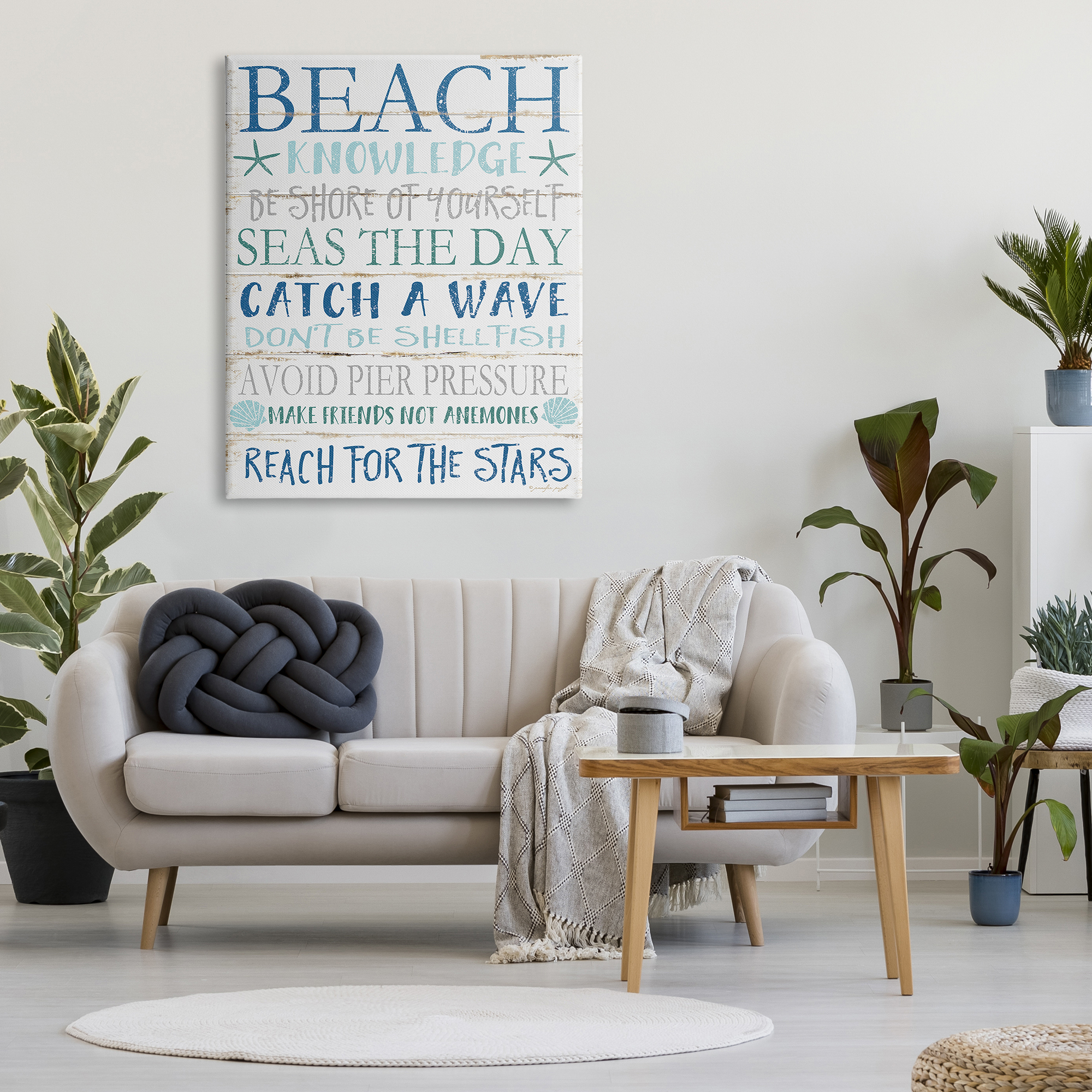 The Stupell Home Decor Beach Knowledge Blue Aqua and White Planked Look Sign