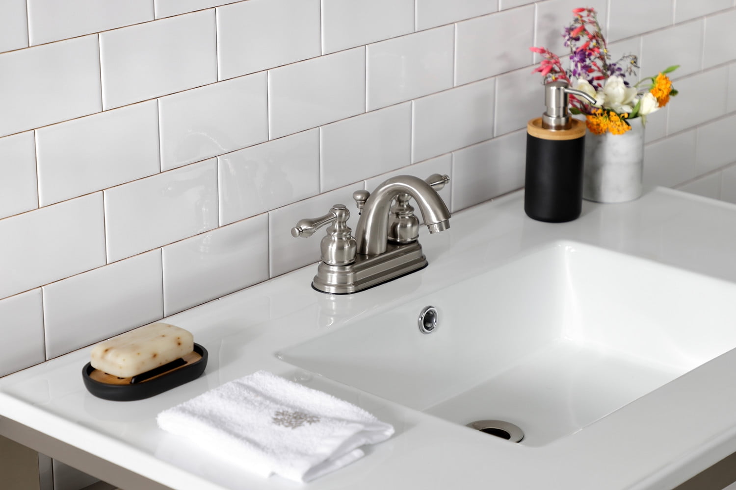 Kingston Brass Restoration Two Handle 4" Centerset Lavatory Faucet with Retail Pop-up