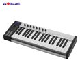thumbnail image 4 of Controlador MIDI WORLDE Blue Whale 37 con 37 teclas semipesadas, pads sensibles a la velocidad y presión con iluminación RGB, y panel de aluminio cepillado plateado. Incluye cable USB, compatible con, 4 of 6