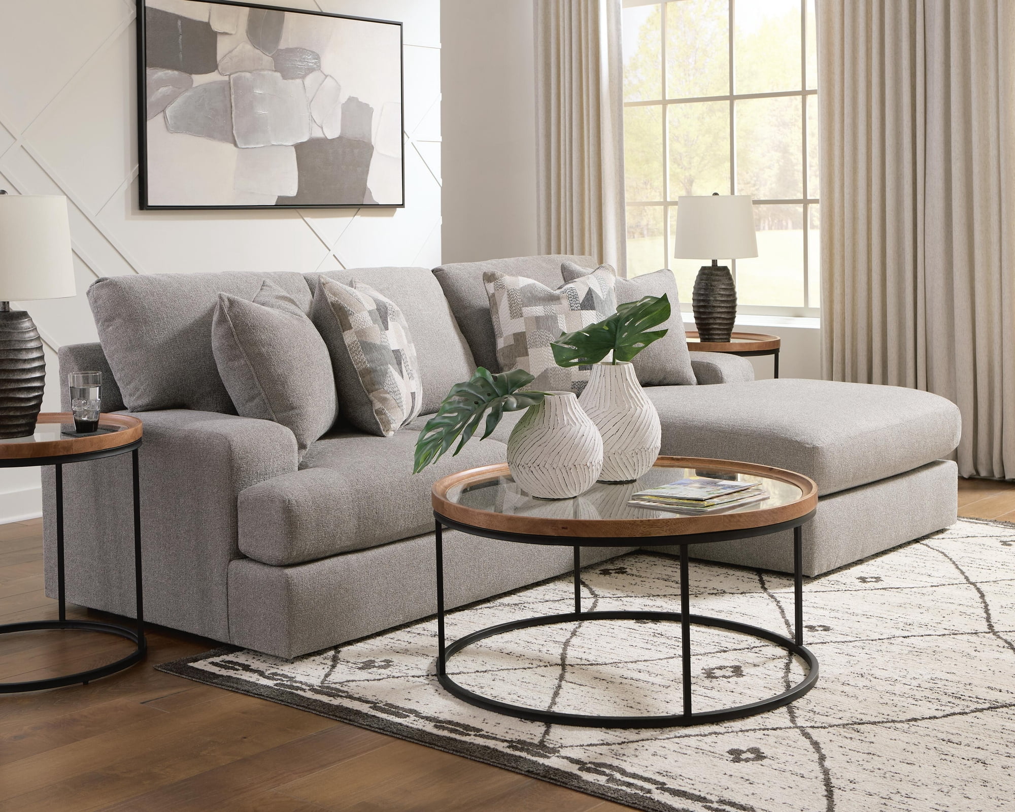Signature Design By Ashley Noraluna Round Cocktail Table in Medium Brown/Black