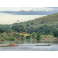 thumbnail image 2 of Noah Jigsaw Puzzle African fisherman rowing a traditional wooden boat on the Ubangi River in Bangui, Central African Republic. 1000 Pieces, 2 of 2