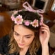 thumbnail image 5 of Corona de flores de Pascua | Accesorio para el cabello con rosas artificiales y hojas verdes | Cinta ajustable | Ideal para fiestas, bodas, festividades, fotografía y uso diario | Rosa vibrante,, 5 of 6