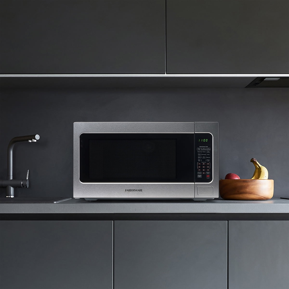 Farberware Countertop Microwave Ov 1100 Watts, 2.2 cu ft - Smart Sensor With LED Lighting and Child Lock - Perfect for Apartments and Dorms - Easy Clean Black Interior, Stainless Steel