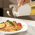 thumbnail image 1 of Botella dispensadora de aceite a prueba de fugas | Apertura y cierre automático | Bote de vinagre de vidrio y plástico | Boquilla antigoteo sin desorden | Almacenamiento de condimentos de cocina | 1, 1 of 6
