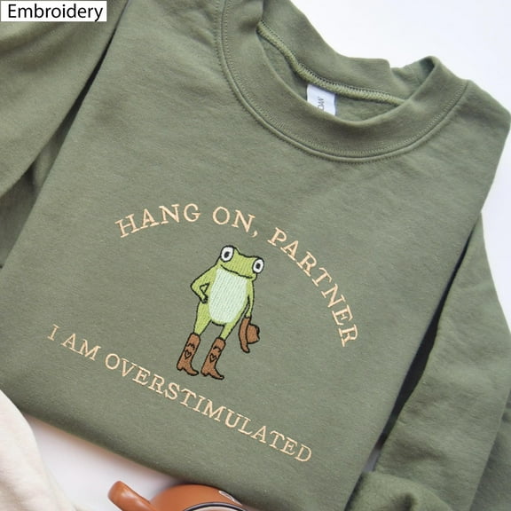 Hold On Partner I’m Overstimulated Frog Embroidered Sweatshirt, Cowboy Frog and Toad Unhinged Embroidery T-Shirt, Weirdcore Crewneck Hoodie