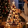 thumbnail image 4 of Illuminated Christmas Town Tree Tabletop Ornament Lighted Village Scene with Church Snowmen Bows and Warm Built In Lights, 4 of 9