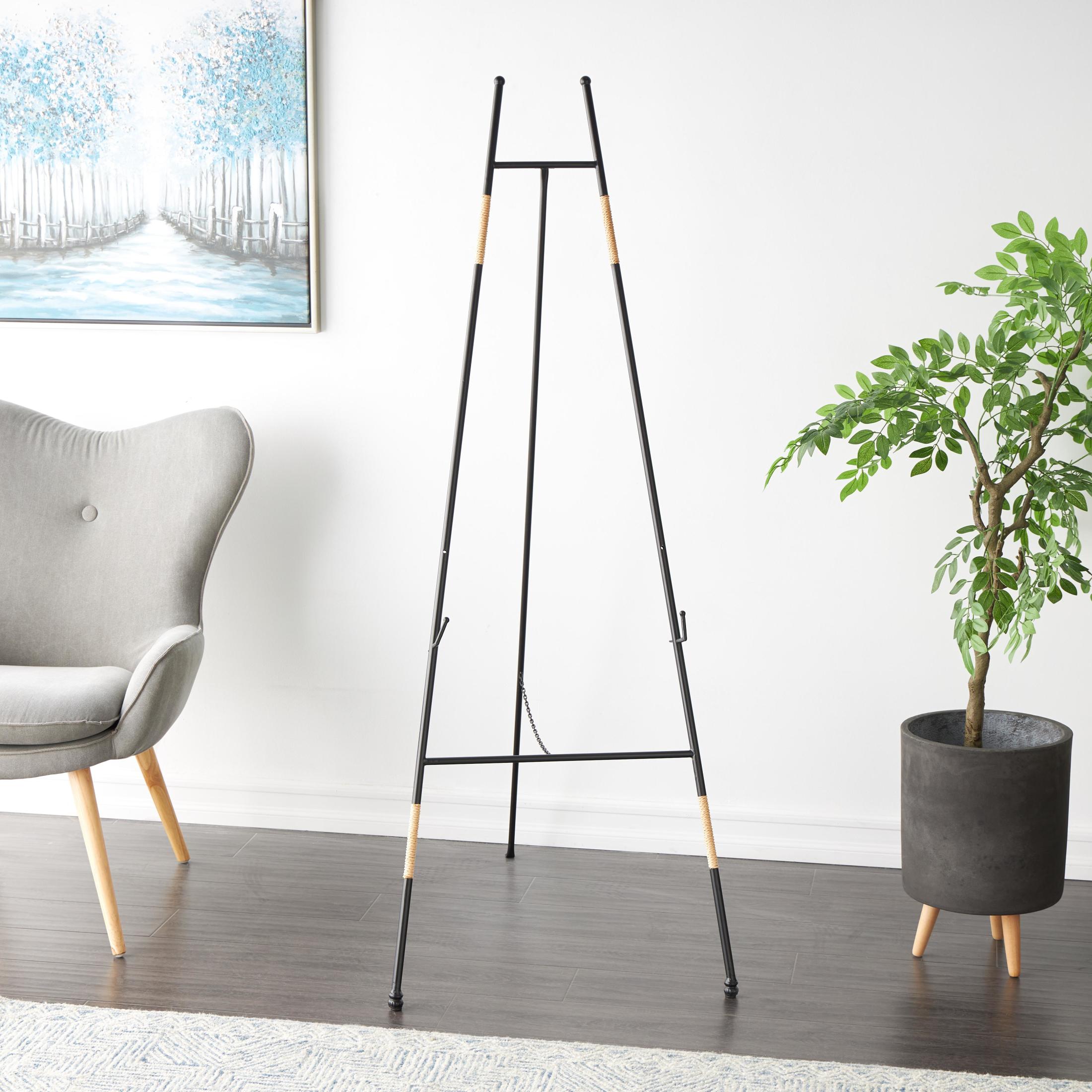 DecMode 25" x 64" Black Metal Slim Foldable Floor 2 Tier Easel with Wrapped Rattan Accents, 1-Piece