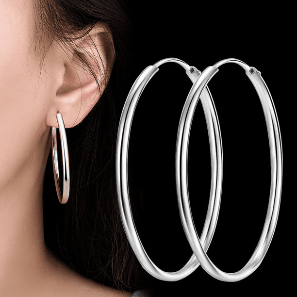 Pendientes de círculo grande exagerados de moda brillante ahuecados lisos de estilo frío de nicho para mujer