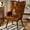 Brown, variant on Pirecart Teddy Fabric Accent Chair, Comfy Upholstered Armchair Mid Century Modern, Wingback Chair with Metal Legs, High Backrest Living Room Chair for Vanity, Bedroom, Black