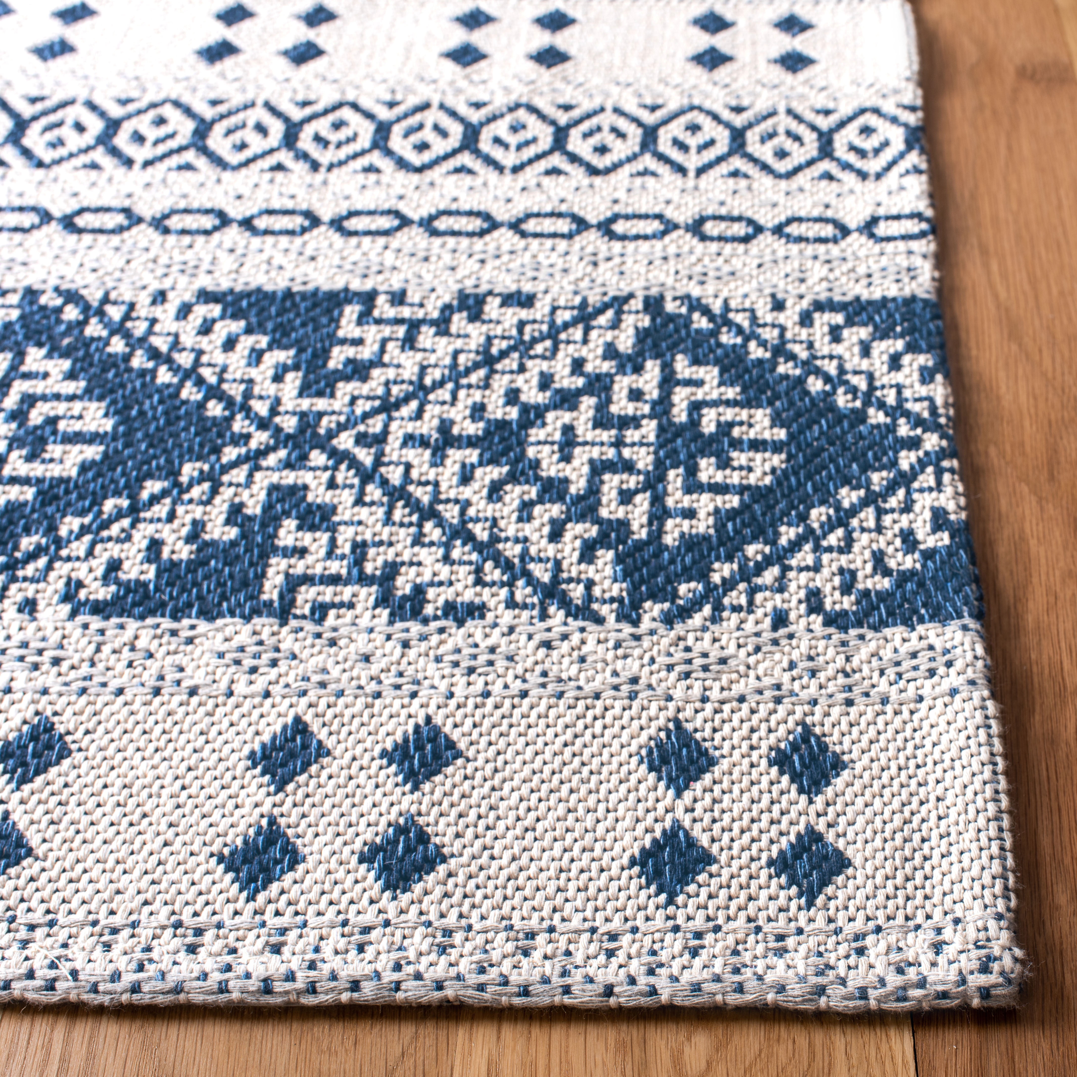 SAFAVIEH Augustine Willoughby Southwestern Runner Rug, Navy/Creme, 2' x 8'