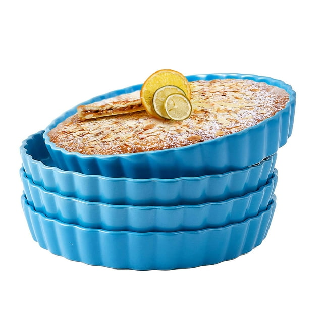 Bruntmor 10" Blue Ceramic Pie Pans Set of 4 displayed in a stacked arrangement with a baked pie topped with lemon slices on the top pan. The vibrant blue bakeware features a scalloped edge design, perfect for baking pies, quiches, or serving dishes. Made from durable ceramic, they are oven safe up to 500F and suitable for microwave, refrigerator, and dishwasher use.
