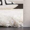 thumbnail image 4 of SAFAVIEH Cloud Edvin Distressed Polyester Shag Area Rug, Ivory/Gray, 5'3" x 7'7", 4 of 7