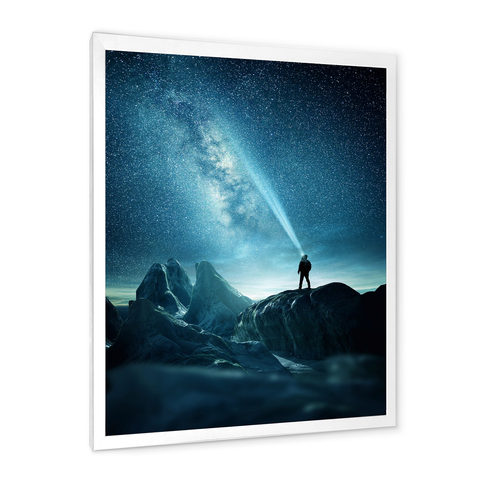 Designart 'A Light Shining by A Man Shining Into The Night Sky' Modern Framed Art Print