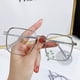 thumbnail image 1 of Gafas lisas con luz azul para mujer, estilo literario, deseo puro, cara de espectáculo de viento, caja pequeña y grande, montura de gafas para miopía, 1 of 6