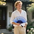 thumbnail image 2 of Elegant Handheld Folding Fan - Chinese Style Bamboo Silk Fan with Hollow Ribs & Tassel - Portable Fan for Dance, Weddings & Everyday Use, 2 of 5