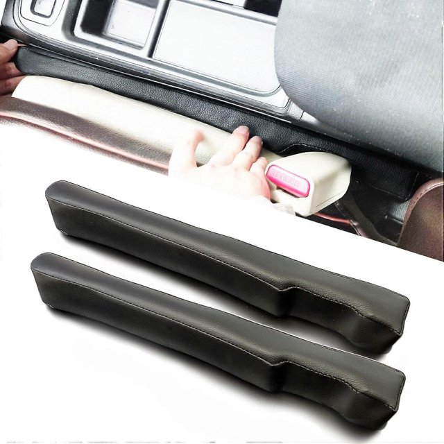 ZHAOCHENG Tapón para ranuras de cuero para asientos de coche, universal, para SUV y camiones, para rellenar el espacio entre el asiento y la consola, color negro, paquete de 2