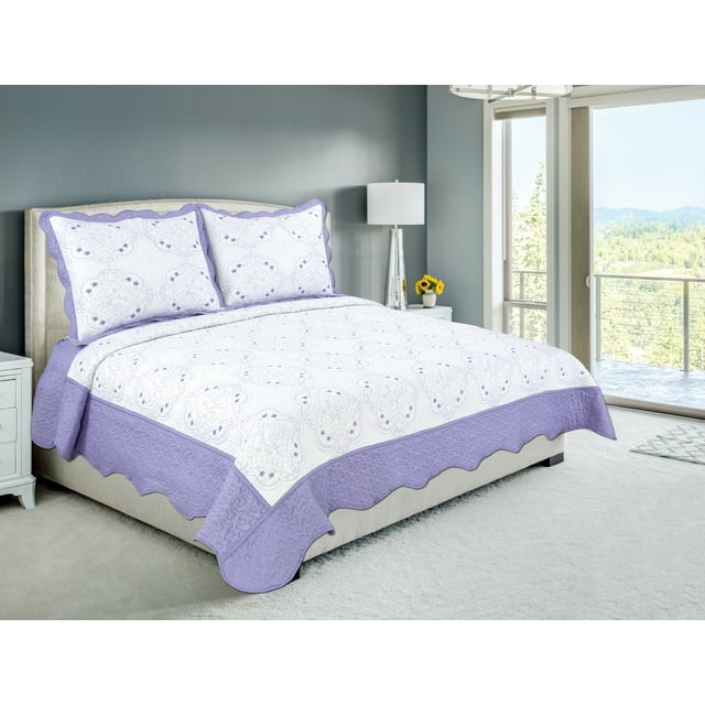 ultra soft embroidered stitching coverlet bedspread and quilted sham set with purple floral pattern on a beige bed frame in bright bedroom