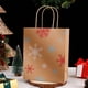 thumbnail image 1 of Bolsas de Regalo Navideñas de Papel Kraft | Bolsas Rústicas con Asas de Cuerda Resistentes | Diseños de Copos de Nieve Multicolores con Diseño de Bosque | Embalaje Ecológico y Duradero para Regalos N, 1 of 6