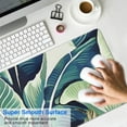 thumbnail image 4 of Ultra Large Mouse Pad: Up Your Game with Our XXL Gaming Mousepad, Green Tropical Leaves Design, Extended Desk Mat Perfect for Keyboards, Laptops & Computers - 31.5x11.8 Inch, 4 of 7