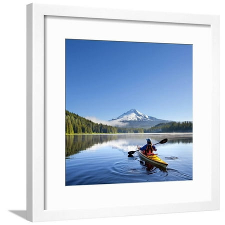 A Woman in a Sea Kayak Paddles on Trillium Lake, Oregon, USA Framed Print Wall Art By Gary