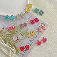 thumbnail image 4 of Set de joyas ELEMIRSA, 24 pares de pendientes con clip para niñas, 4 of 5