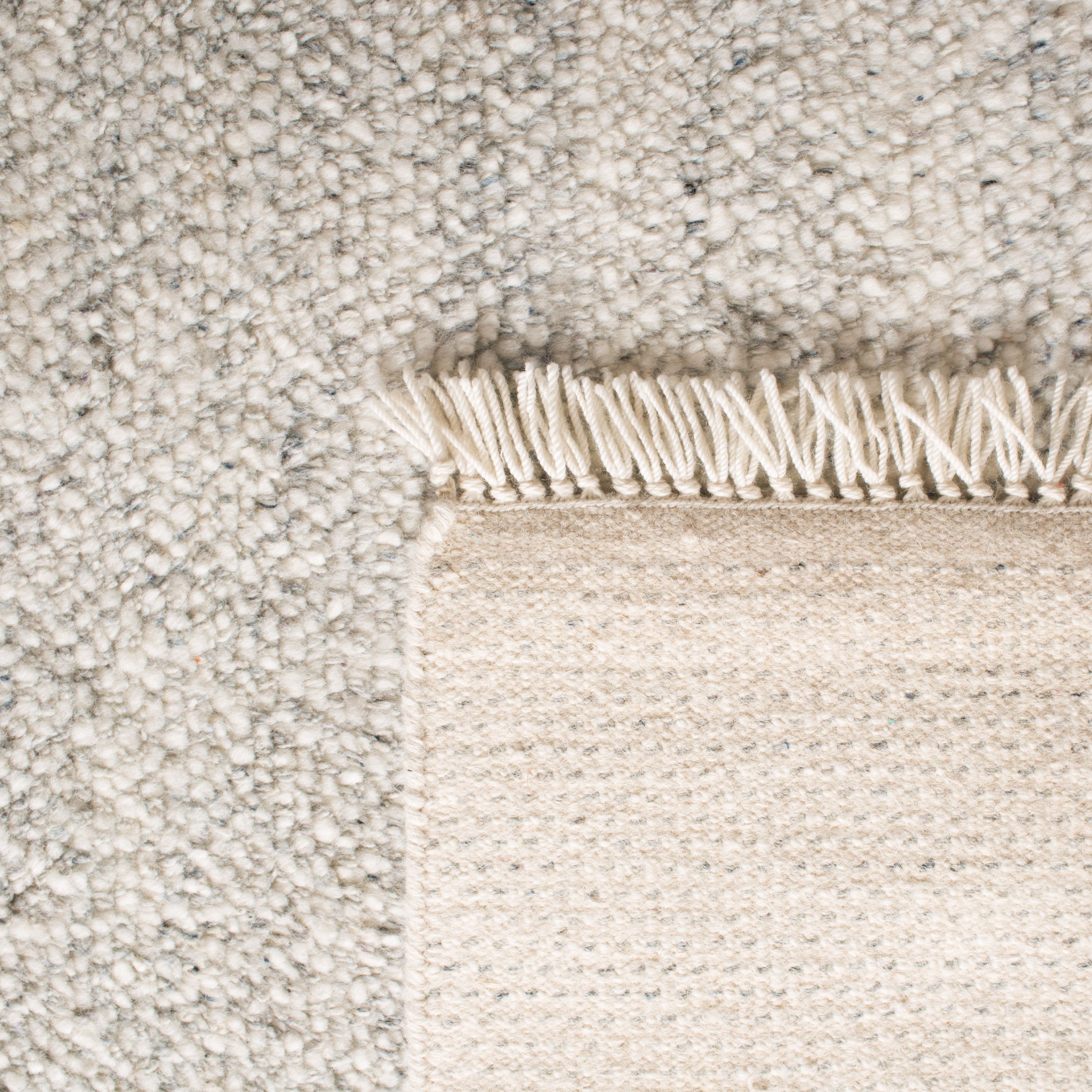 SAFAVIEH Casablanca Carbrey Solid Wool Shag Area Rug, Grey, 4' x 6'